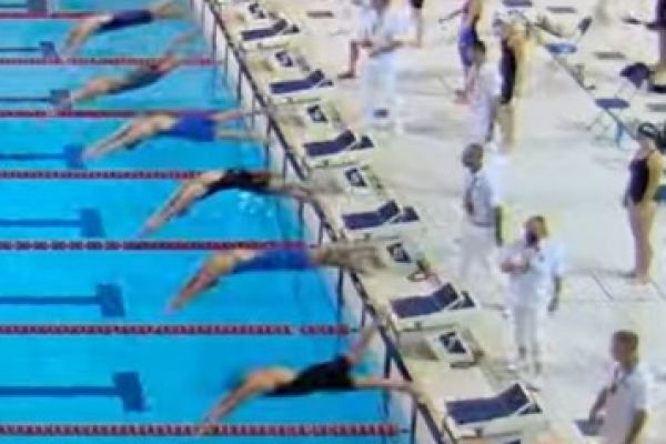 Photo of people diving into pool